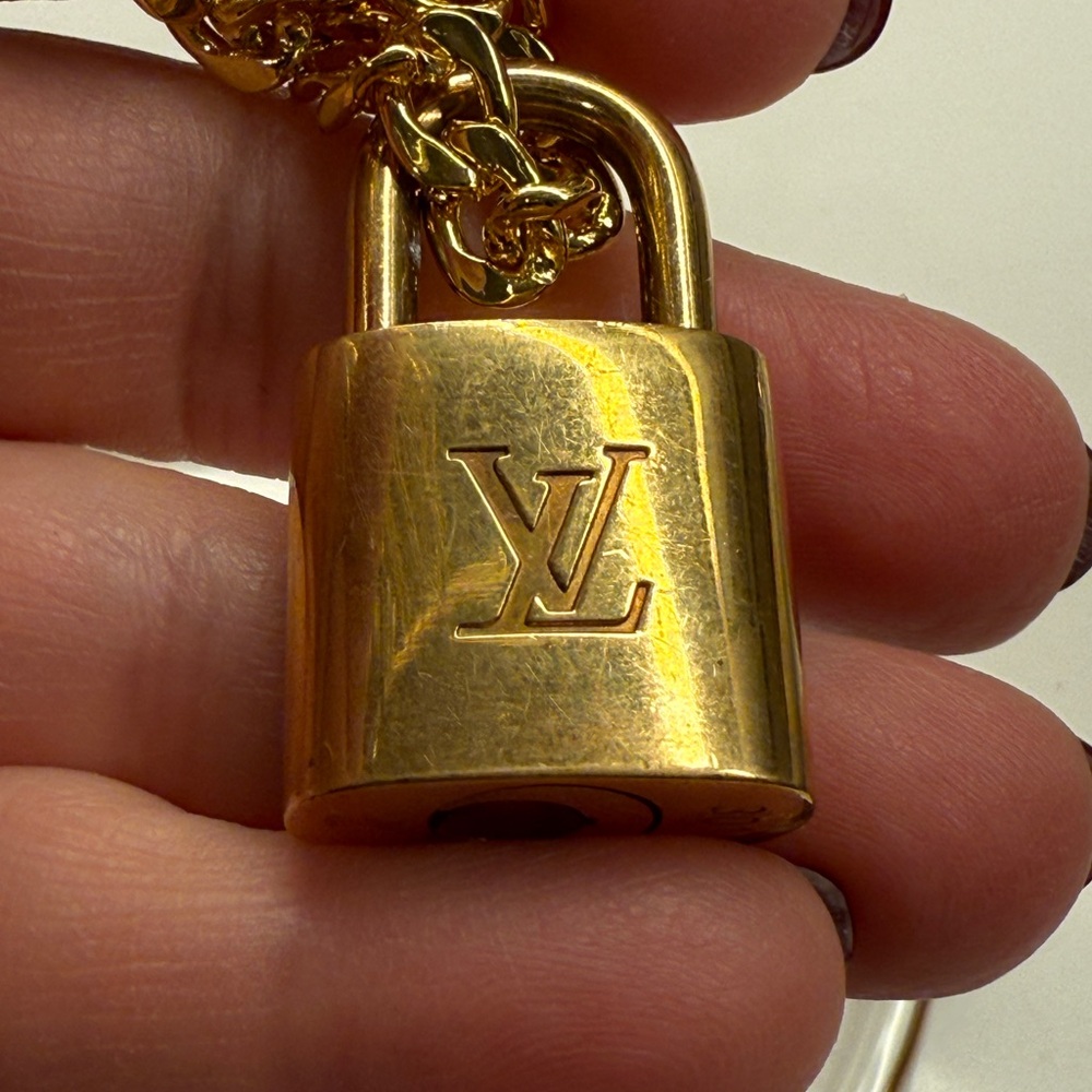 Louis Vuitton Gold Padlock with Key